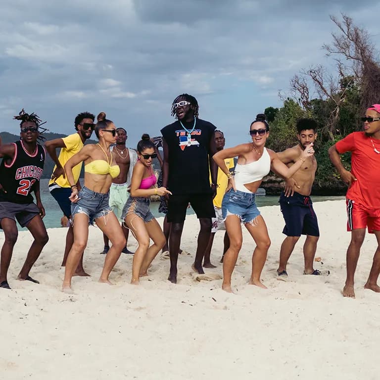 Zumba Retreat moment — dancing, catamaran party and Caribbean beach scenes in Samaná