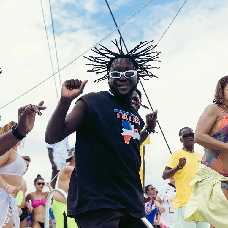 Zumba Retreat moment — dancing, catamaran party and Caribbean beach scenes in Samaná