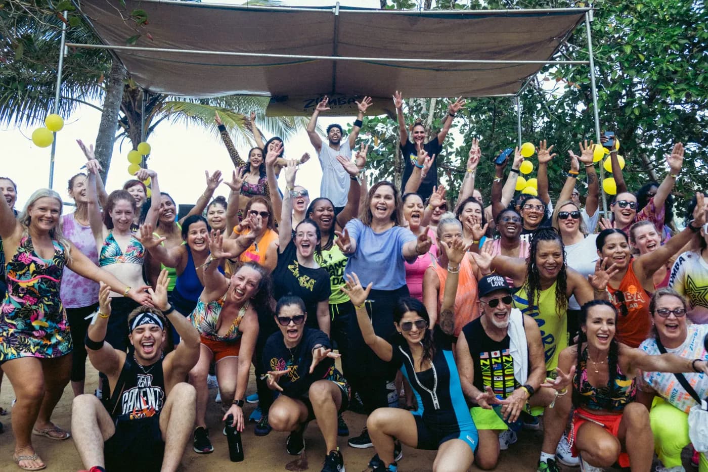Zumba Retreat moment — dancing, catamaran party and Caribbean beach scenes in Samaná