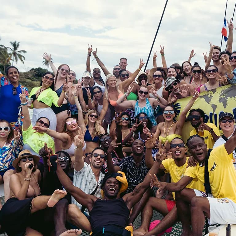 Zumba Retreat moment — dancing, catamaran party and Caribbean beach scenes in Samaná