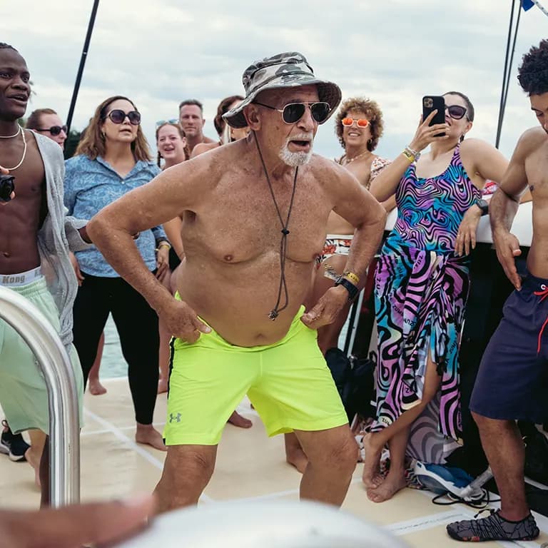 Zumba Retreat moment — dancing, catamaran party and Caribbean beach scenes in Samaná