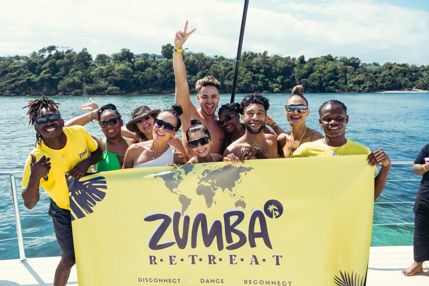 Zumba Retreat moment — dancing, catamaran party and Caribbean beach scenes in Samaná