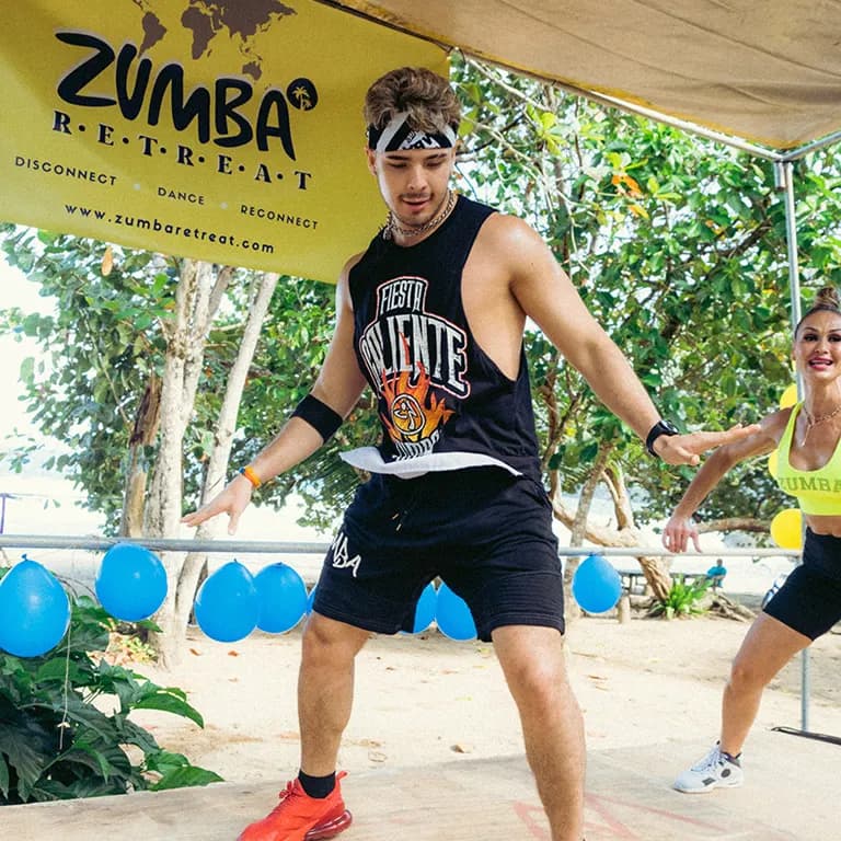 Zumba Retreat moment — dancing, catamaran party and Caribbean beach scenes in Samaná