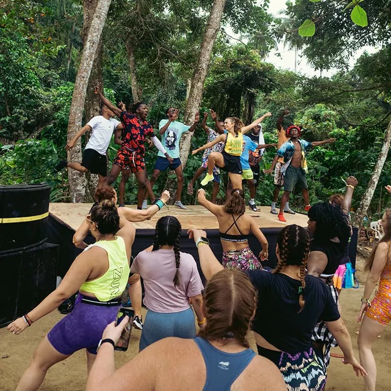 Zumba Retreat moment — dancing, catamaran party and Caribbean beach scenes in Samaná